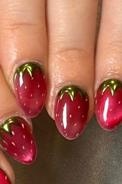 Stiletto translucent red jelly nails with strawberry shape art