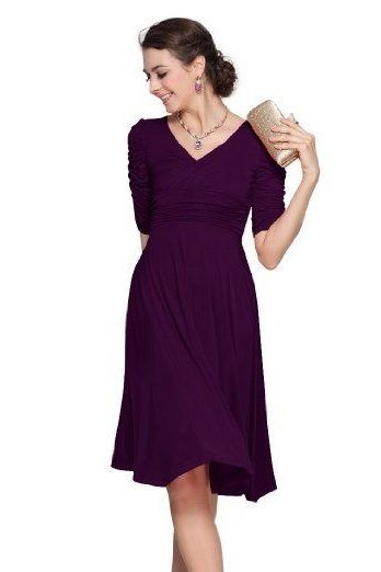 Woman in purple wrap midi dress with heels