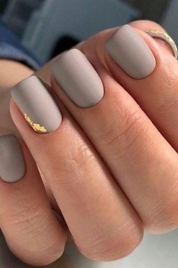 grey taupe matte short nails with gold fleck