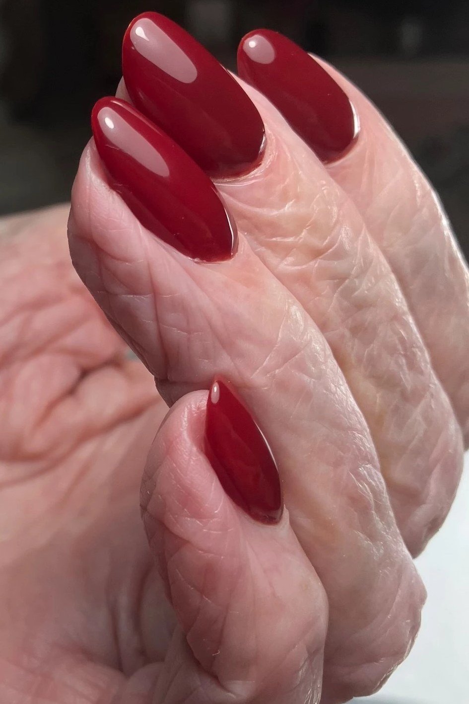 Classic Red Almond Nails nail design for women over 40