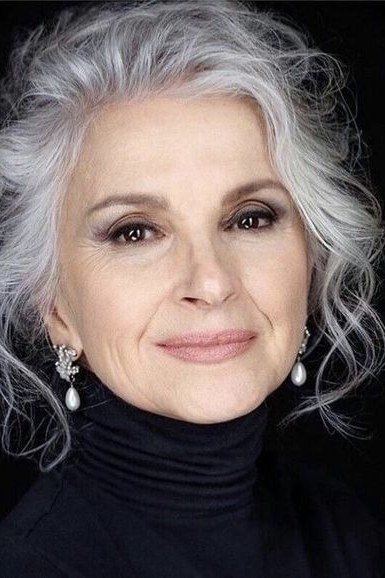 silver layered bob with loose waves and face-framing pieces, front view hairstyle for women over 70