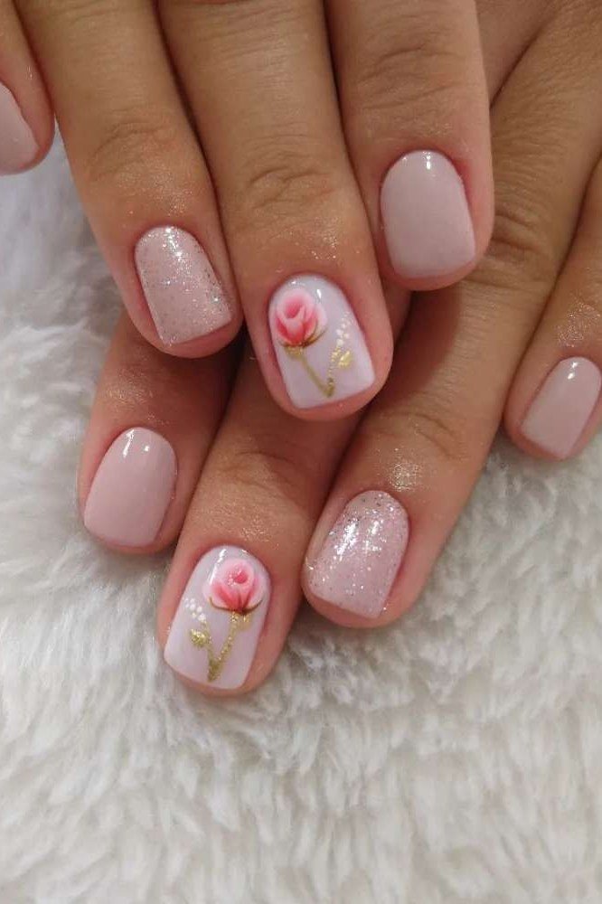 short nude pink nails with tiny hand painted rose art