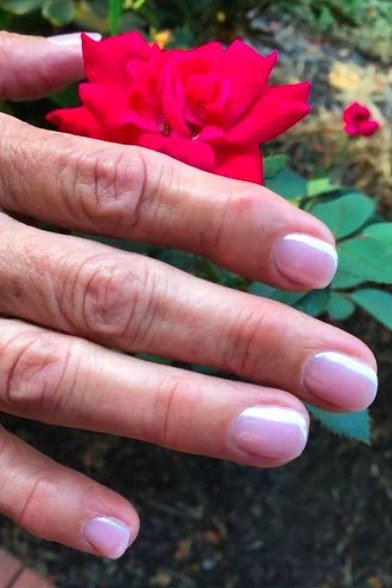 pink shimmer nails with red rose