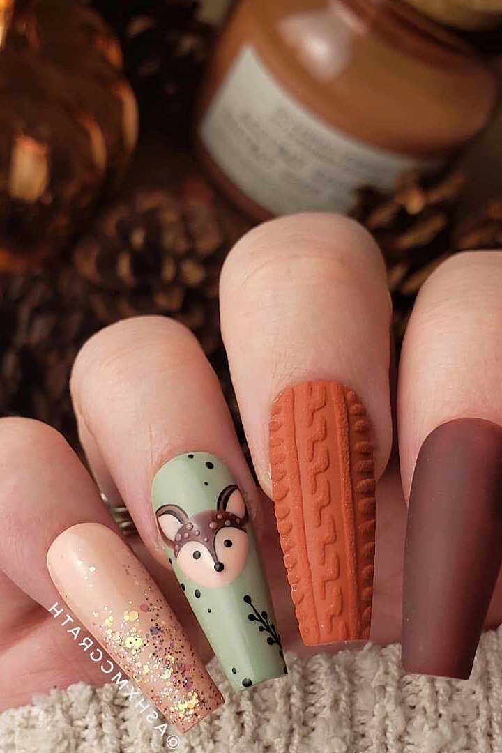 Matte brown nails with sweater knit texture and deer art fall nails