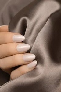 Taupe nude nails on satin fabric, sophisticated nail design for women over 50
