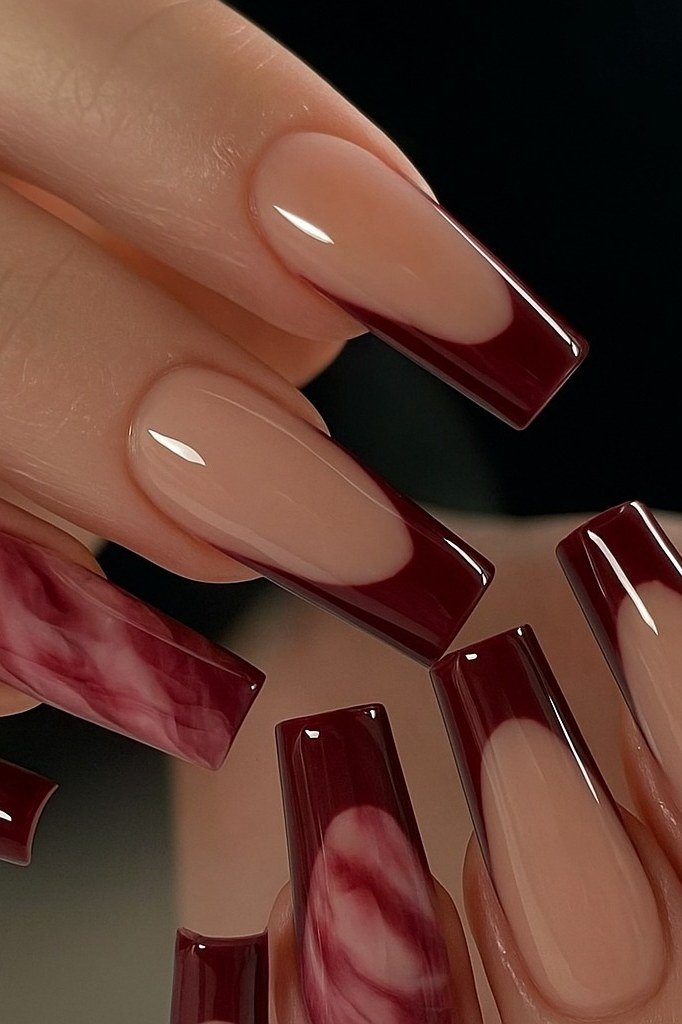 Nude nails with burgundy marble french square tips for women over 50