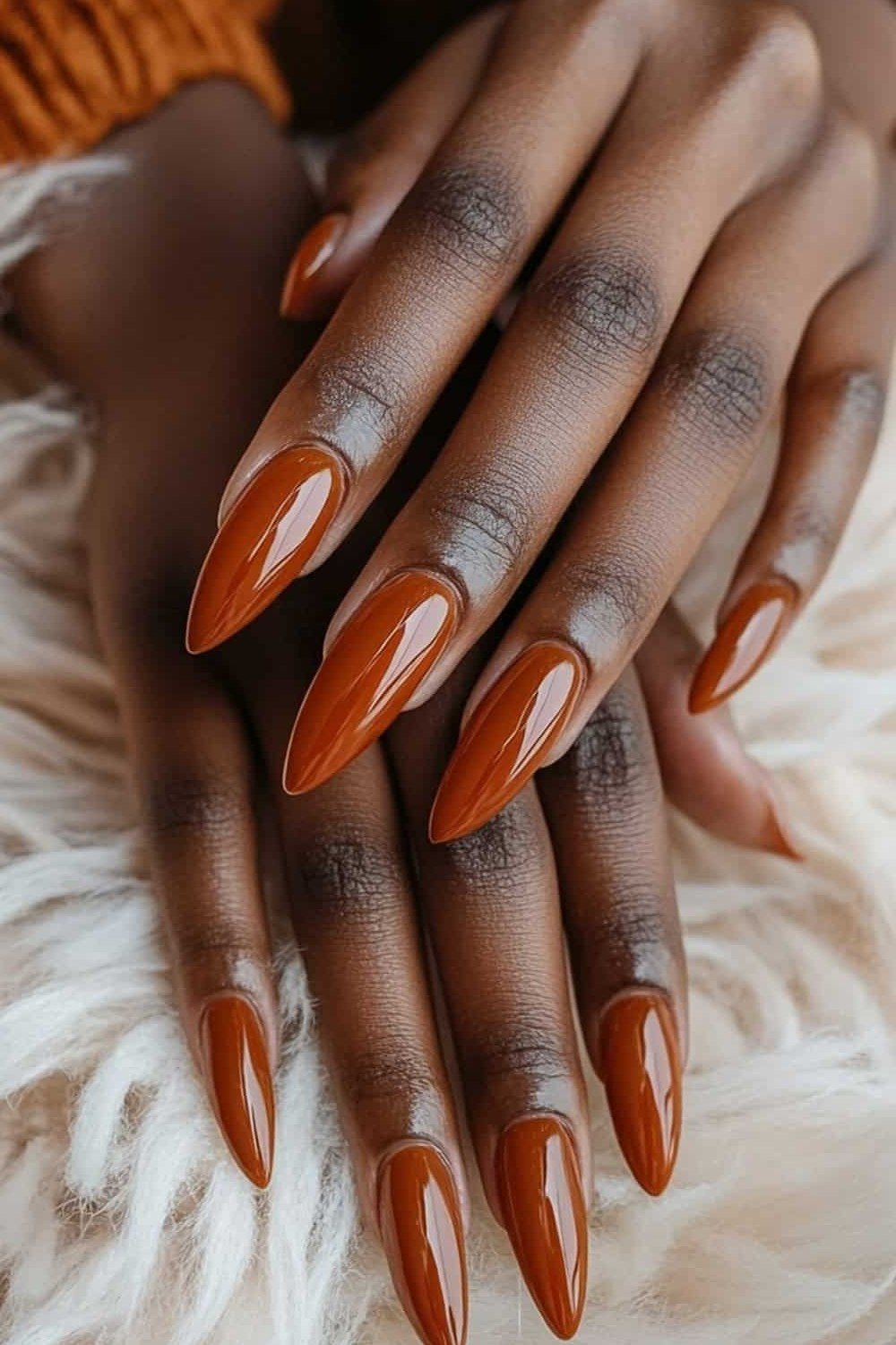 Terracotta Almond on Deep Skin - fall nail color idea for women over 60