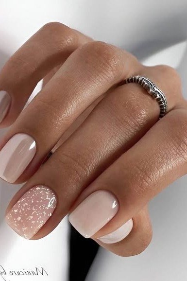 Nude with Gold Glitter Accent - elegant nail art idea for mature hands, women over 50