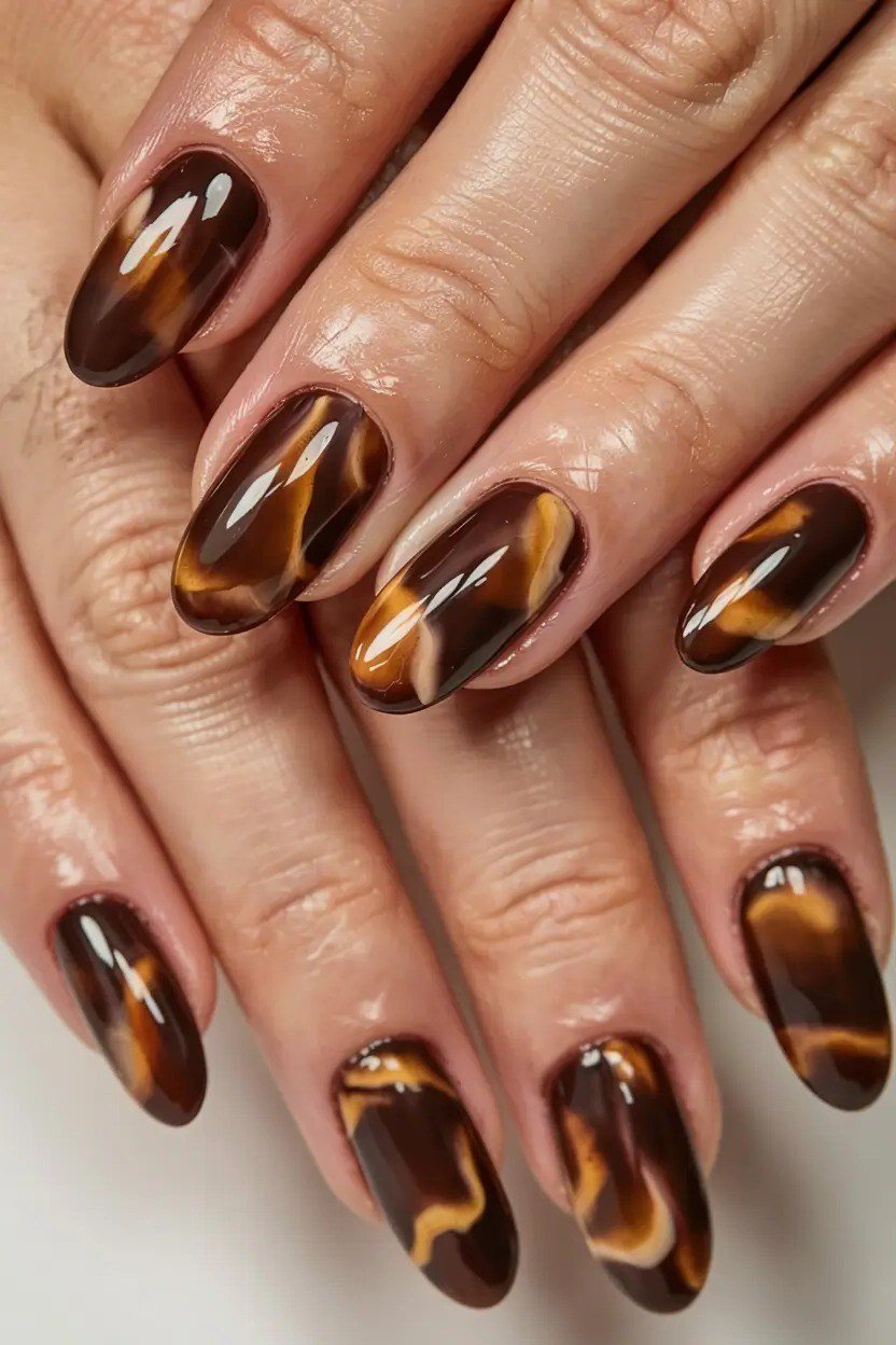 Chocolate Swirl Almond Nails, chocolate brown fall nail design for women over 60