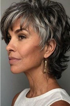 Textured Salt and Pepper Shag with Bangs - medium shag haircut for women over 40