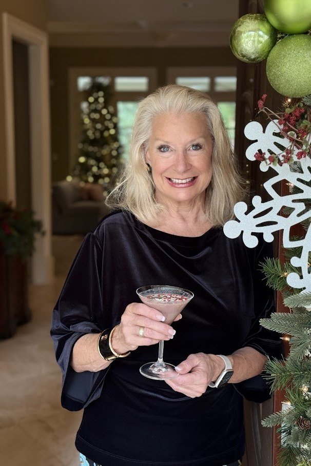 holiday evening outfit for women over 60: black velvet top with holiday cocktail