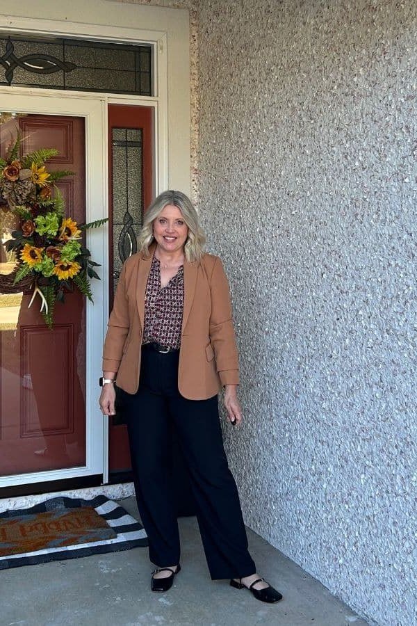 Camel Jacket with Black Wide-Leg Trousers on a woman over 50, fall outfit idea