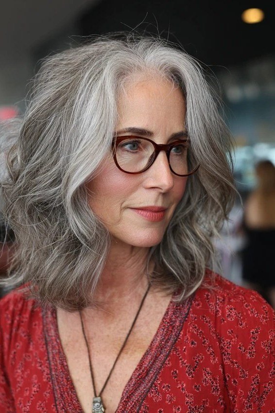 Wavy Grey Shoulder Hair with Glasses - grey hairstyle for women over 60