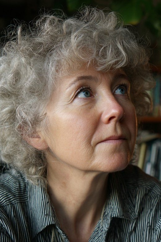 Big voluminous curly silver hair