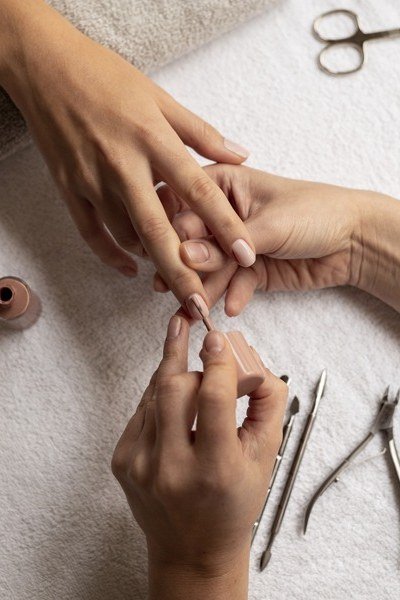 Salon Manicure with Tools - elegant nail art idea for mature hands, women over 50