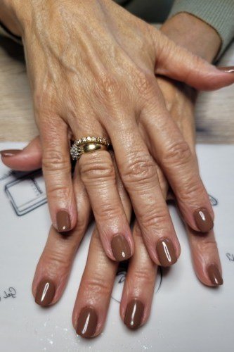 Taupe Brown Oval Nails on Elderly Hands - old money fall nail color for women over 40