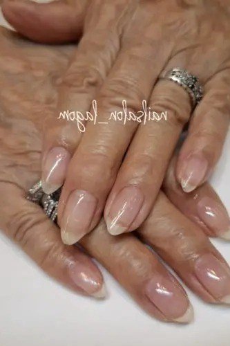 Natural nude nails with rings for women over 50