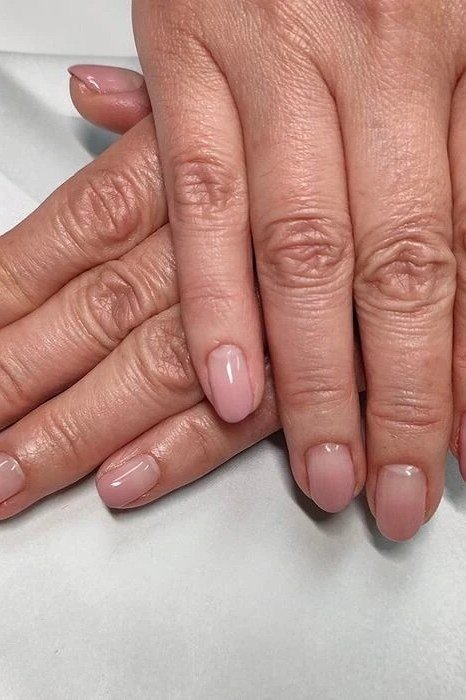 Nude Pink Gel Nails gel nail idea for women over 60