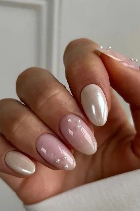 White chrome almond nails with mirror shine