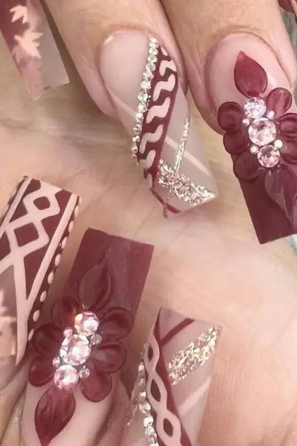 Burgundy Stiletto with 3D Floral nail design for women over 40