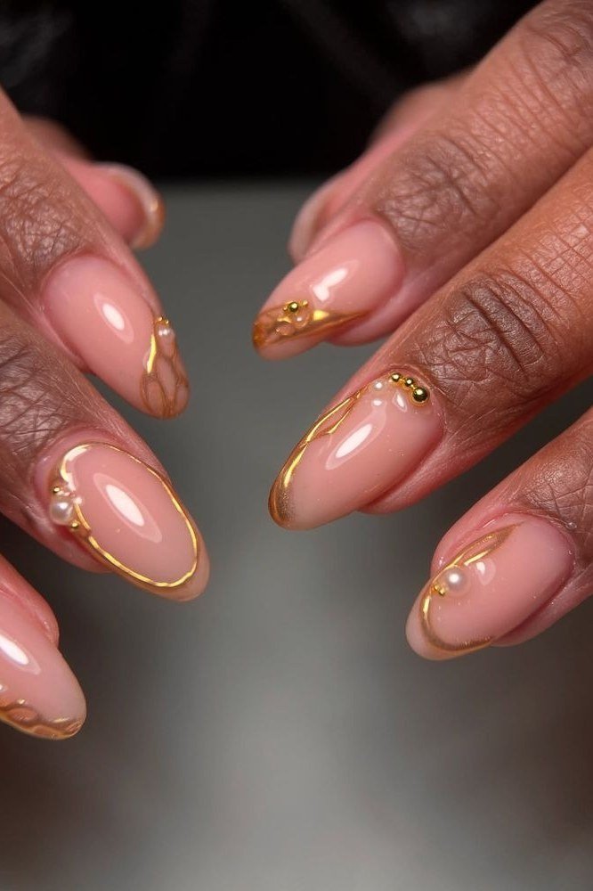 Nude Nails with Gold Swirl Art - flattering nail polish shade that hides veins for women over 50