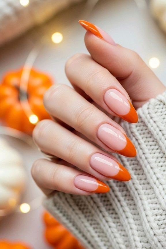 Orange french tip pumpkins, fall nail design for women over 60