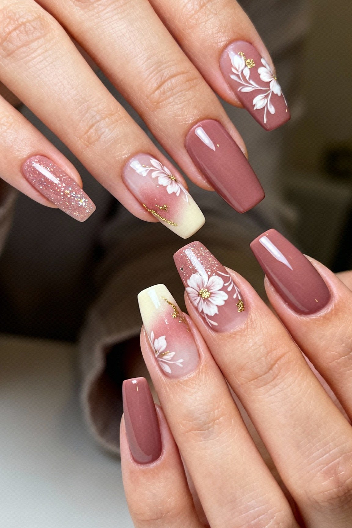 Mauve Nails with White Florals and Rhinestones, elegant mauve nail idea for women over 60