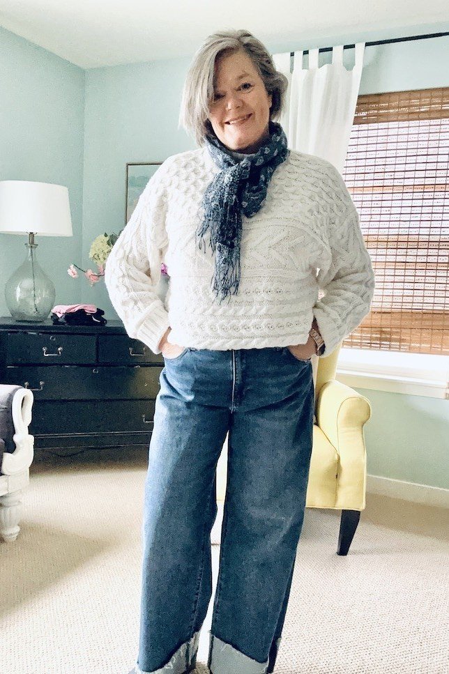 white cable knit and navy scarf fall outfit for women over 60