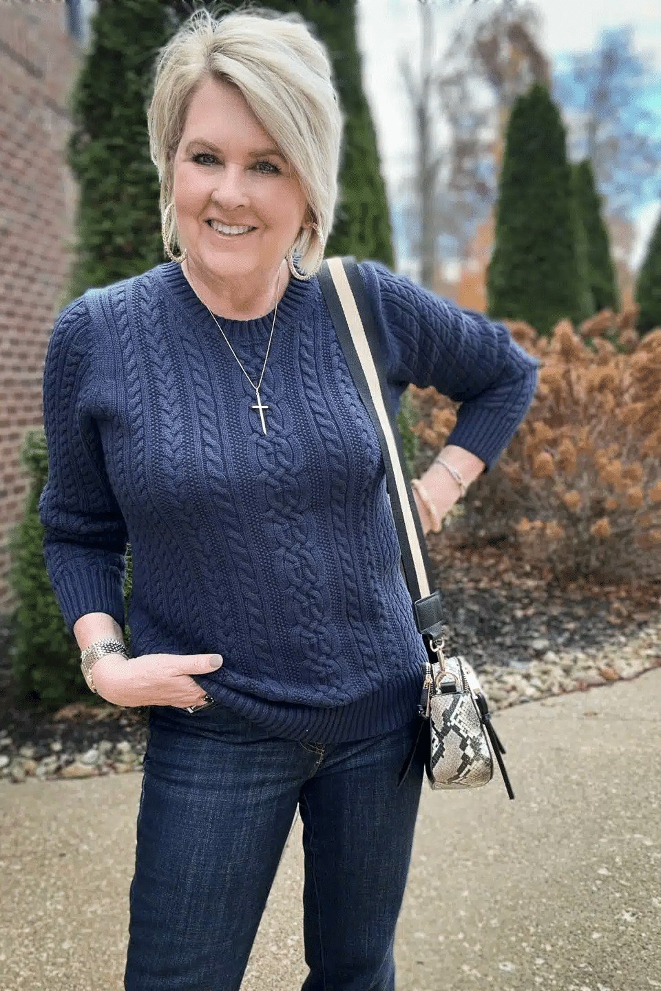 Navy cable knit sweater dark jeans navy cable knit sweater blue jeans blonde 50s - fall outfit idea for women over 40