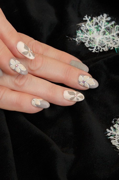 Nude Grey Nails with Snowflake Accents for women over 60