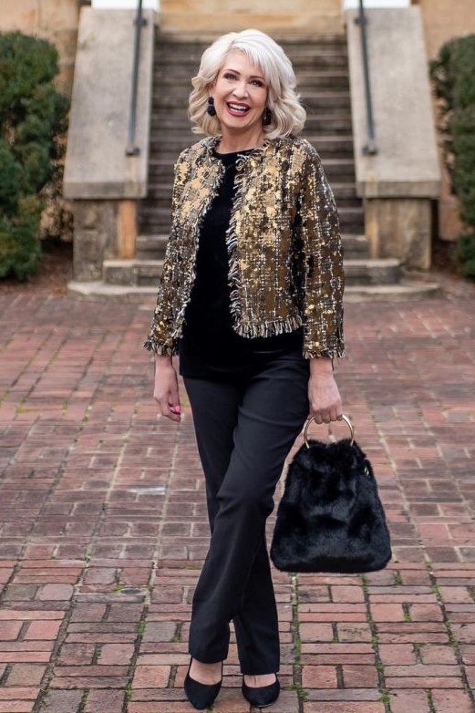 holiday evening outfit for women over 60: gold sequin jacket with black pants