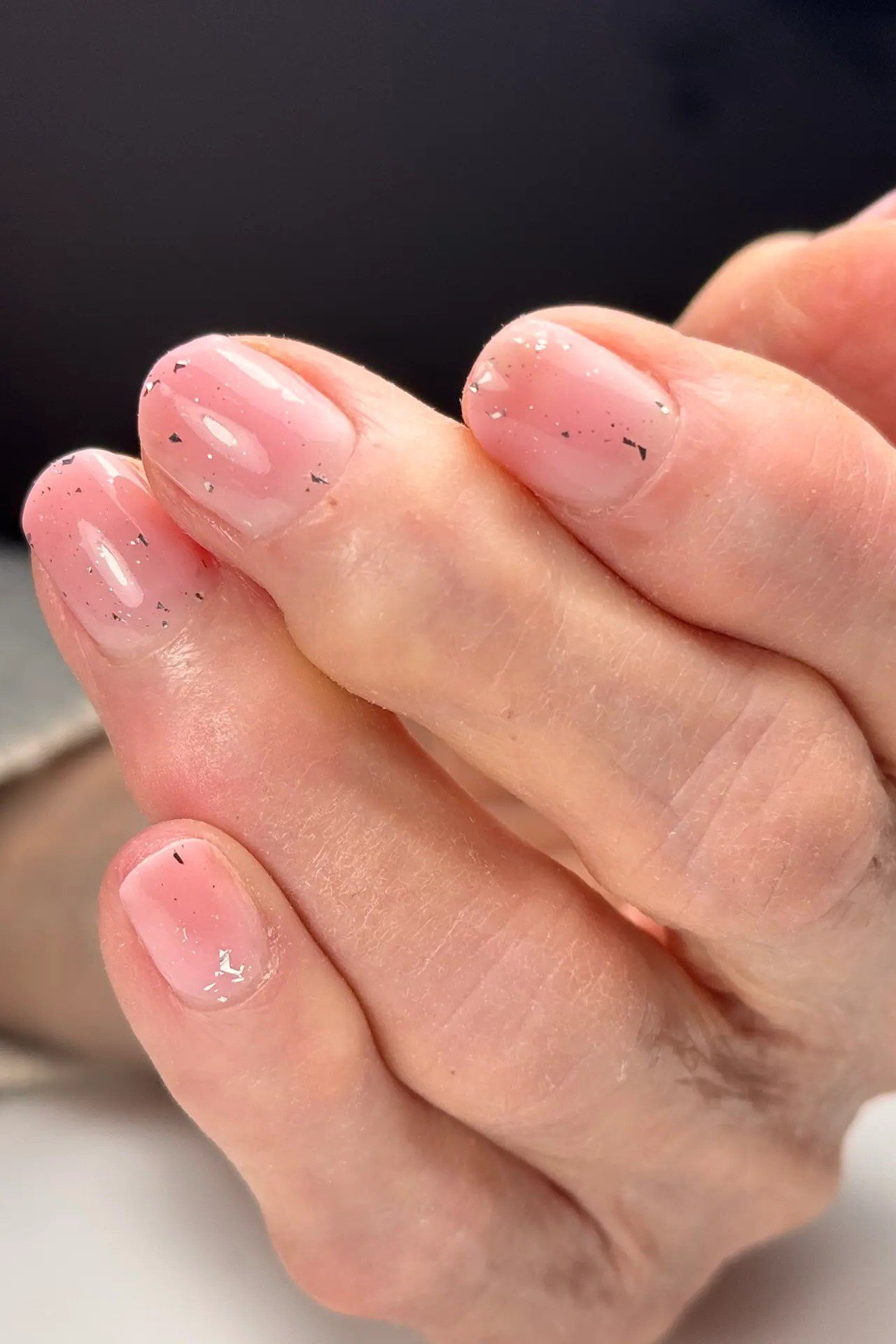 Sheer Pink Glitter Gel Nails gel nail idea for women over 60