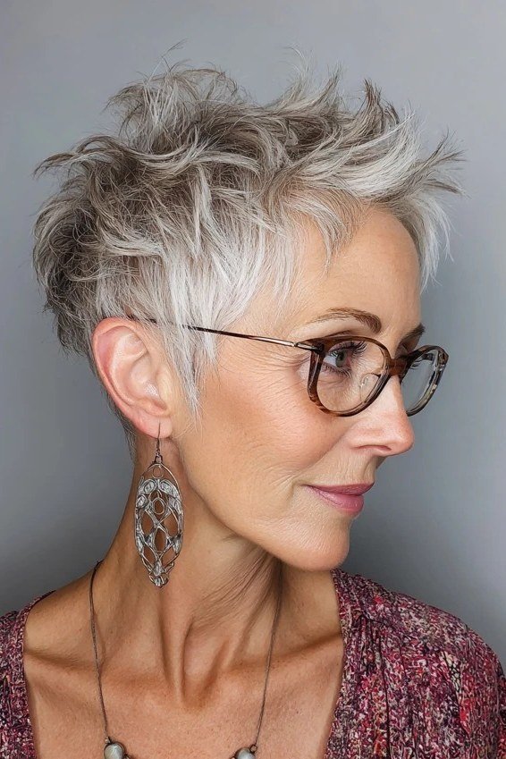 curly gray pixie with glasses for women over 50 side view