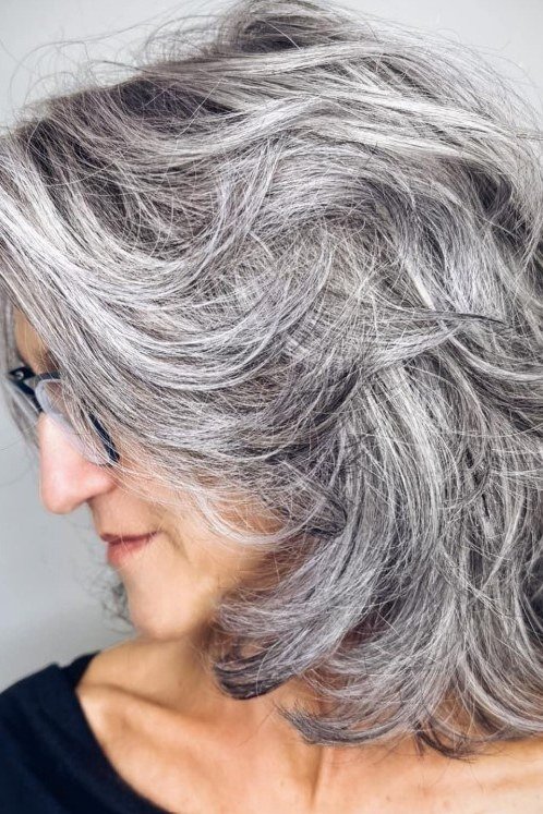 Windswept Grey Shag - grey hairstyle for women over 60
