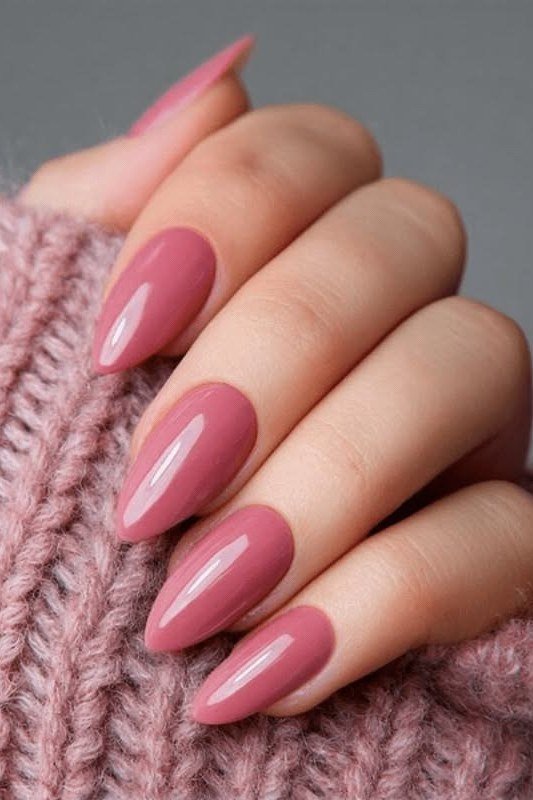 Raspberry pink almond glossy, elegant fall nail design for women over 40