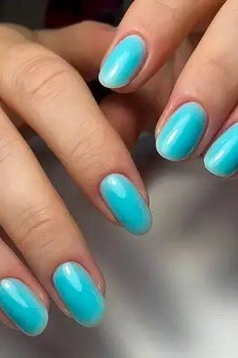 Bright turquoise nails, best manicure idea for women over 60
