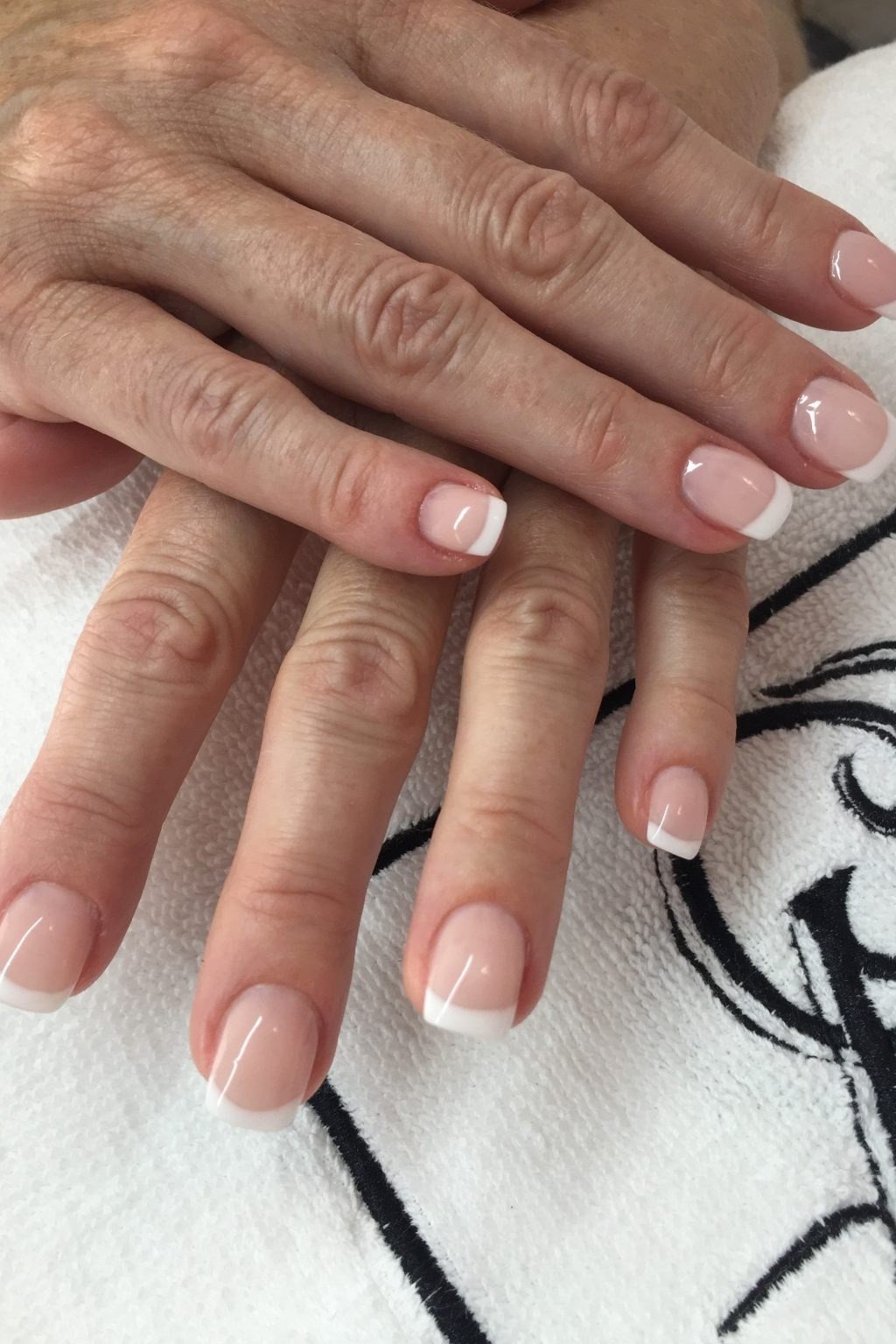 French square nails on mature hands