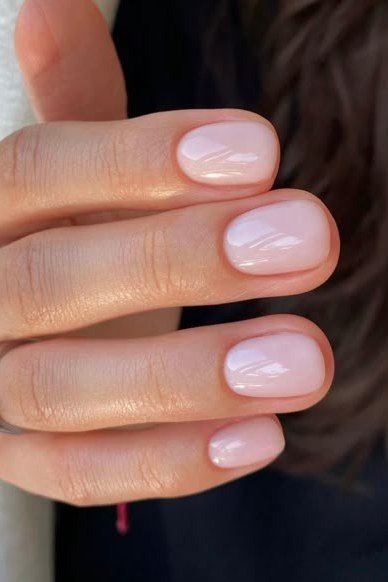 Sheer Pink Oval with Glossy Finish - elegant nail art idea for mature hands, women over 50