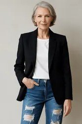 Woman over 50 wearing black blazer with ripped jeans, everyday casual outfit idea