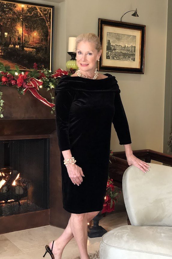 holiday evening outfit for women over 60: black velvet sheath dress