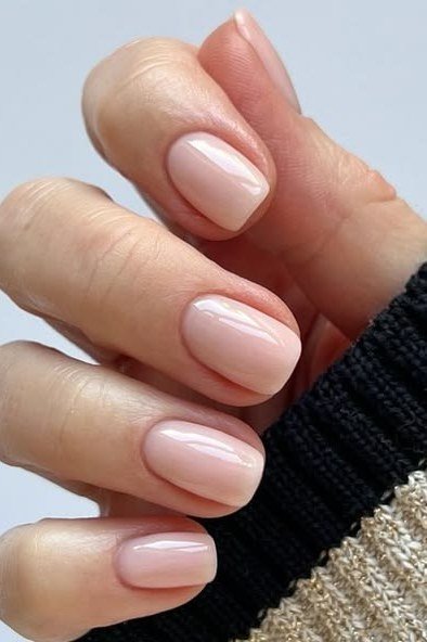 Nude short nails with black cuff for women over 50
