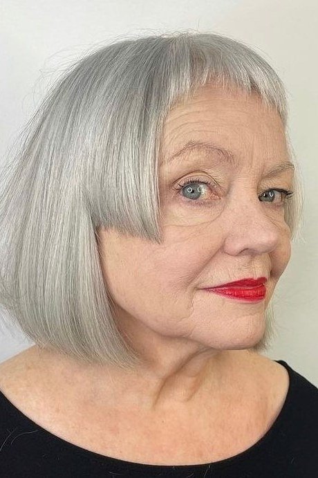 White Bob with Blunt Bangs - grey shoulder length hairstyle for women over 60