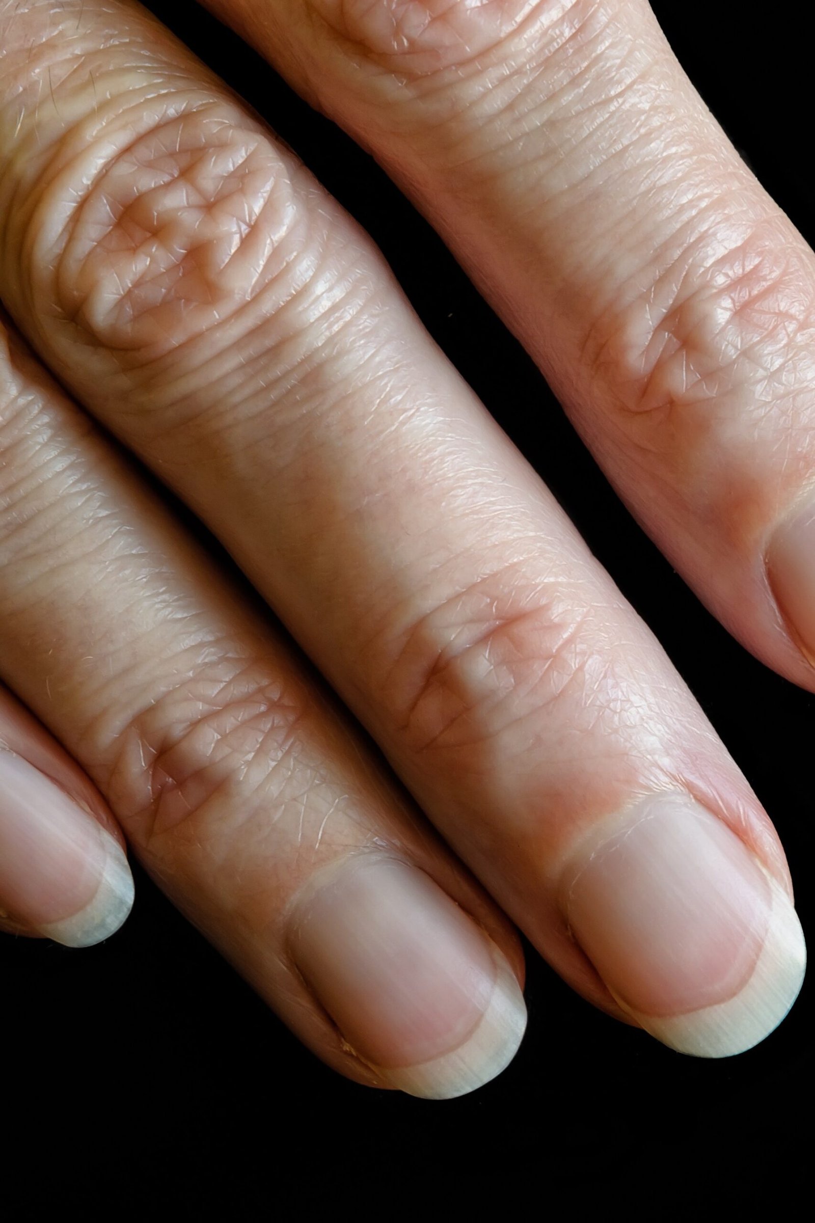 Overnight oil treatment with cotton gloves for mature hands