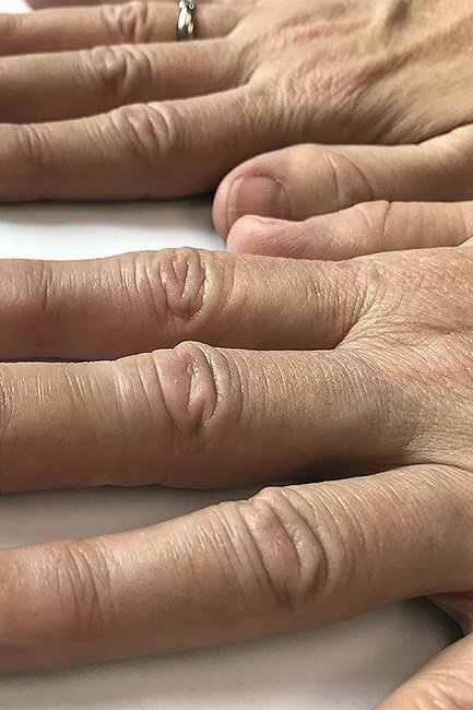 short squoval, nude, one mature hand on white , for women over 60