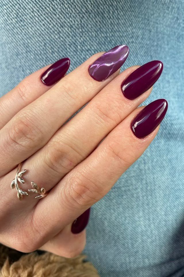 Glossy plum burgundy almond nails for women over 50