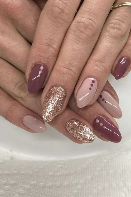 Plum nude with gold glitter accent almond, elegant fall nail design for women over 40