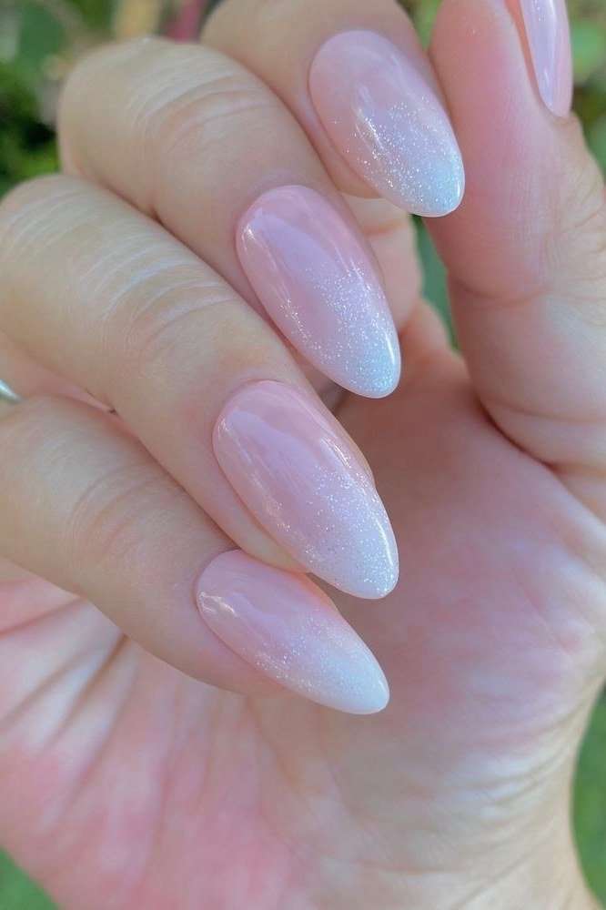 Best nails for women over 50: pearly pink almond