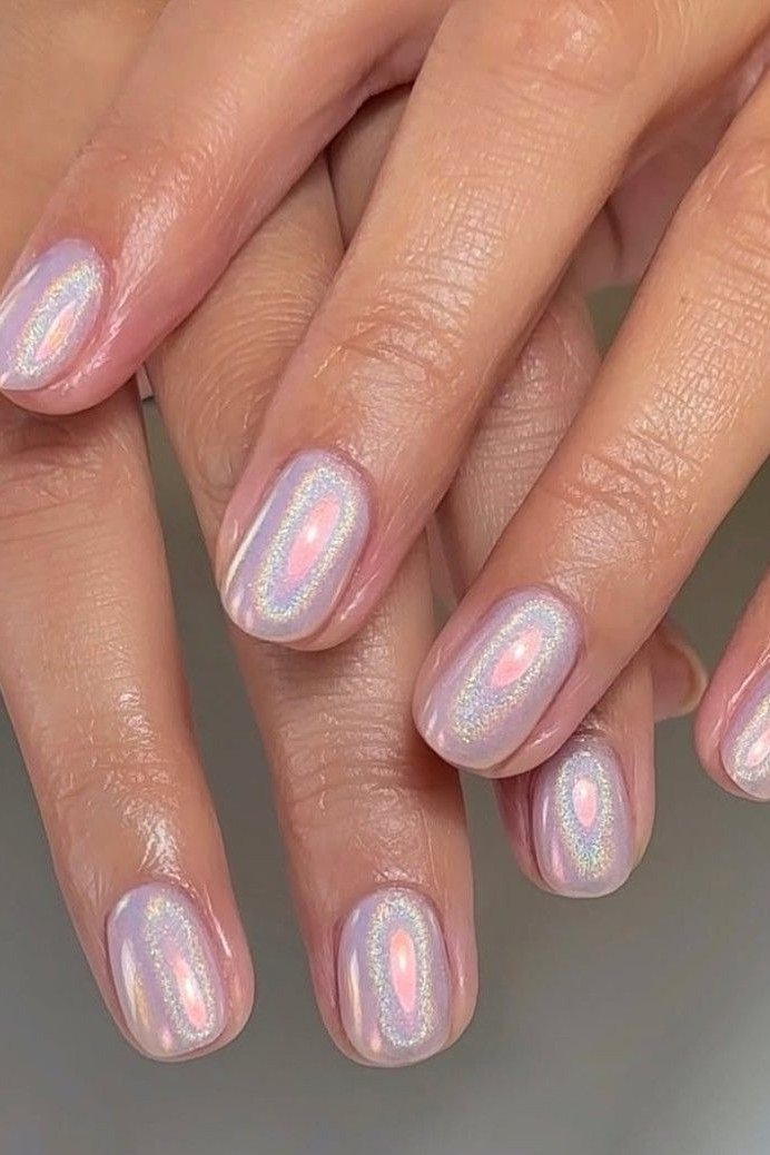 Nail art design for women over 60: pearl chrome almond nails