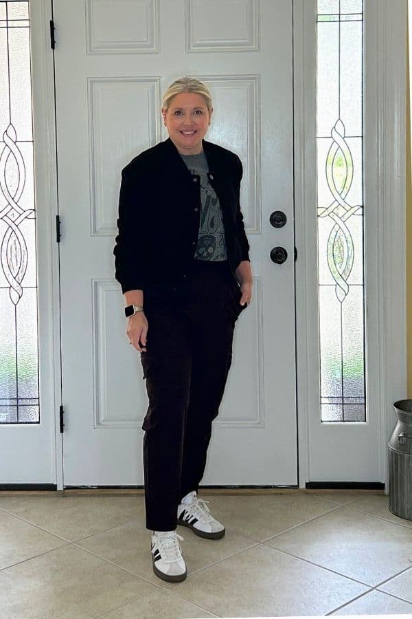 Blue Jacket with a Patterned Top and Dark Jeans on a woman over 50, fall outfit idea