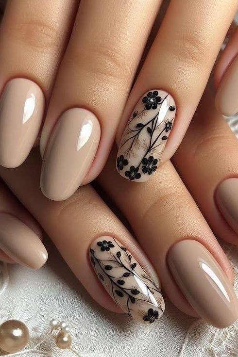 nude nails with black floral line art